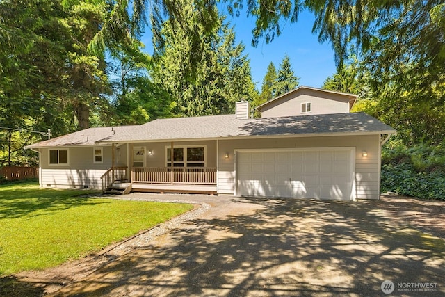 4050 NE 197th St, Lake Forest Park, WA 98155 - view of front of property with driveway, a front lawn, a chimney, and an attached garage