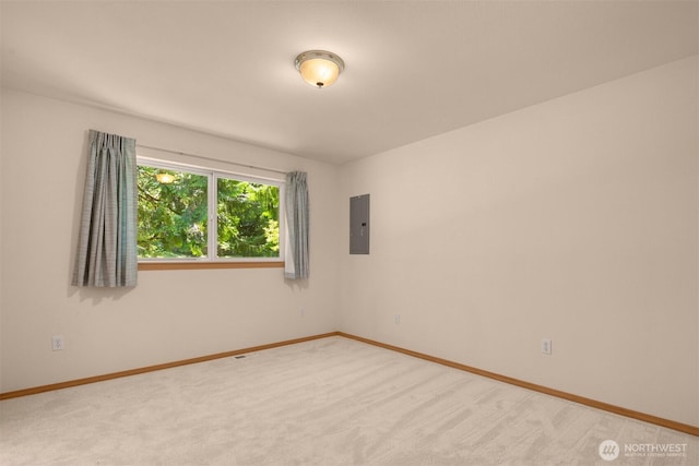 4050 NE 197th St, Lake Forest Park, WA 98155 - carpeted empty room featuring electric panel and baseboards