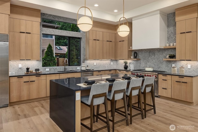 11618 NE 111th St, Kirkland, WA 98033 - kitchen featuring modern cabinets, open shelves, high quality appliances, dark countertops, and light brown cabinetry