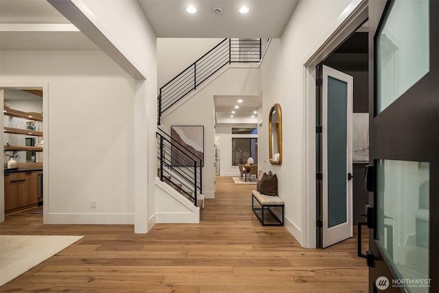 11618 NE 111th St, Kirkland, WA 98033 - entryway featuring stairway, light wood-style floors, and recessed lighting