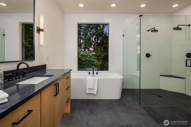 11618 NE 111th St, Kirkland, WA 98033 - bathroom featuring vanity, a freestanding tub, tiled shower, and recessed lighting