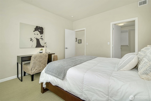 17 W Mercer St Unit 212, Seattle, WA 98119 - bedroom with light carpet and a walk in closet