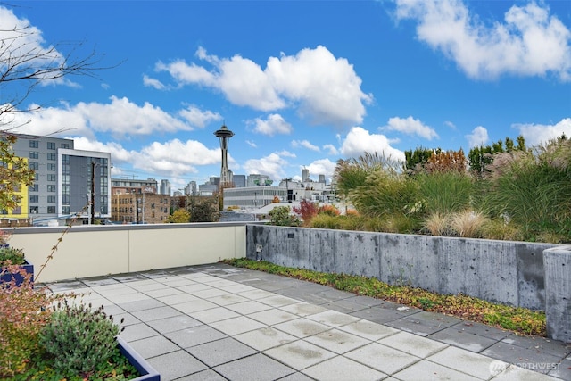 17 W Mercer St Unit 212, Seattle, WA 98119 - view of patio / terrace featuring a city view
