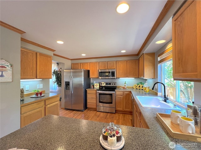 26504 126th Pl SE, Kent, WA 98030 - kitchen featuring stainless steel appliances, ornamental molding, recessed lighting, and light wood-type flooring
