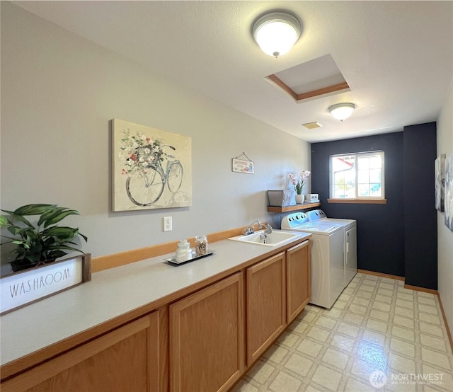 26504 126th Pl SE, Kent, WA 98030 - laundry area featuring washer and clothes dryer, light flooring, and cabinet space