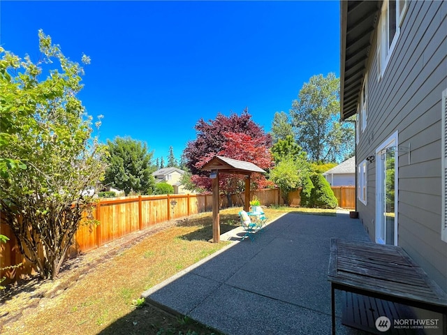 26504 126th Pl SE, Kent, WA 98030 - fenced backyard featuring a patio area