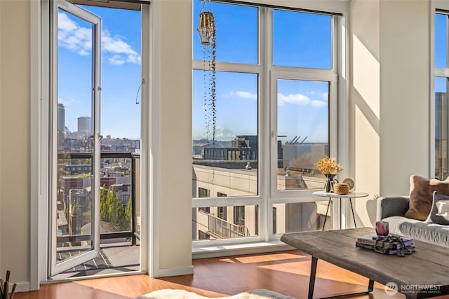 2721 1st Ave Unit 1101, Seattle, WA 98121 - doorway with a view of skyline and wood finished floors