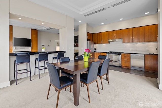 2721 1st Ave Unit 1101, Seattle, WA 98121 - dining space with recessed lighting and light carpet