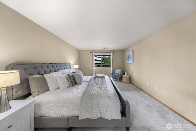 9727 NE Juanita Dr Unit 308, Kirkland, WA 98034 - bedroom featuring light colored carpet and baseboards