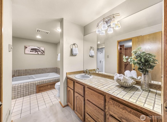 9727 NE Juanita Dr Unit 308, Kirkland, WA 98034 - bathroom featuring tile patterned floors, a bath, and vanity