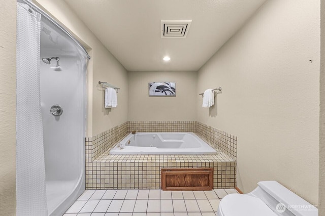 9727 NE Juanita Dr Unit 308, Kirkland, WA 98034 - full bath featuring a stall shower, a whirlpool tub, and tile patterned floors