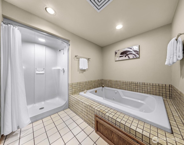 9727 NE Juanita Dr Unit 308, Kirkland, WA 98034 - full bathroom with a whirlpool tub, tile patterned flooring, a shower with shower curtain, and recessed lighting