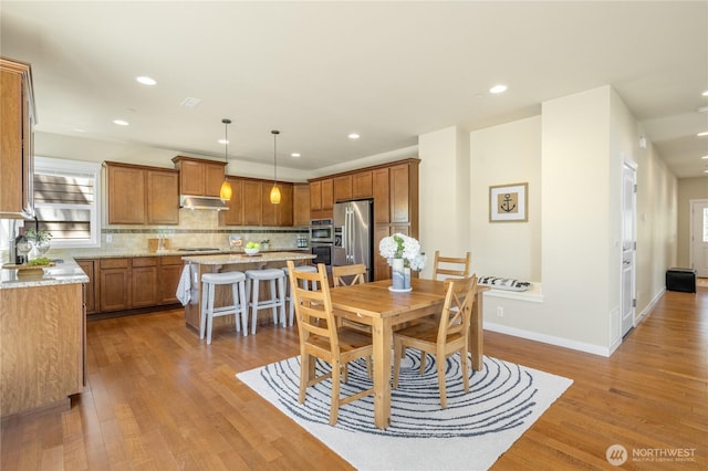 1501 209th Ave NE, Sammamish, WA 98074 - dining room with wood finished floors and recessed lighting