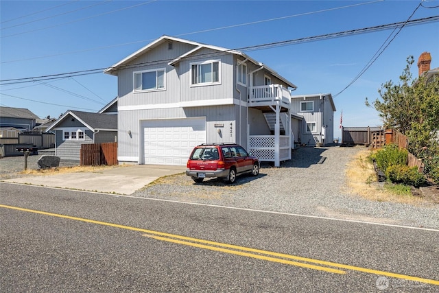 4421 Sucia Dr, Ferndale, WA 98248 - view of front of property featuring stairs, concrete driveway, and a garage