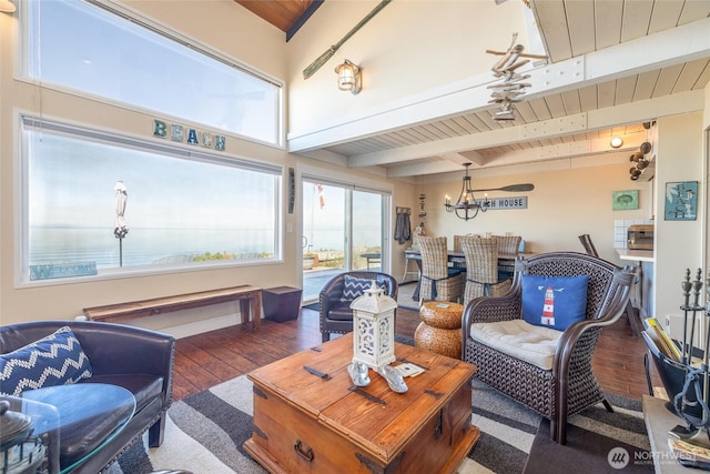 4421 Sucia Dr, Ferndale, WA 98248 - living room featuring hardwood / wood-style floors, a wood ceiling with exposed beams, and a chandelier