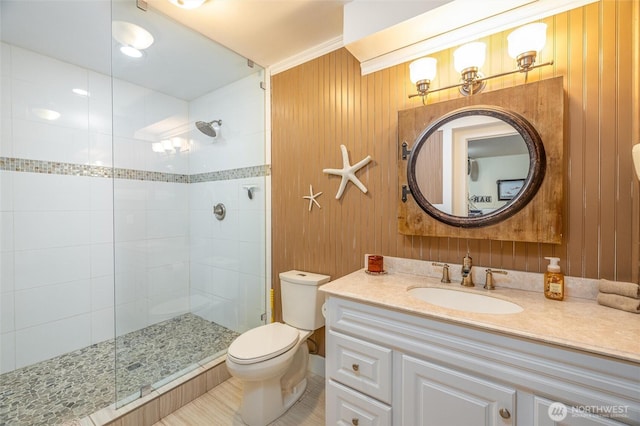 4421 Sucia Dr, Ferndale, WA 98248 - full bath featuring a tile shower, vanity, and wood walls