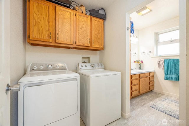 4421 Sucia Dr, Ferndale, WA 98248 - laundry room with washing machine and dryer and cabinet space