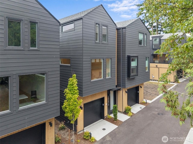 1323 N 185th St Unit A, Shoreline, WA 98133 - view of side of home with an attached garage