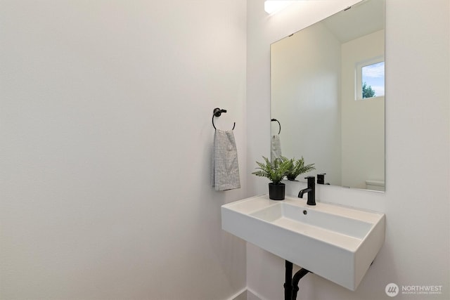 1323 N 185th St Unit A, Shoreline, WA 98133 - bathroom with a sink and baseboards