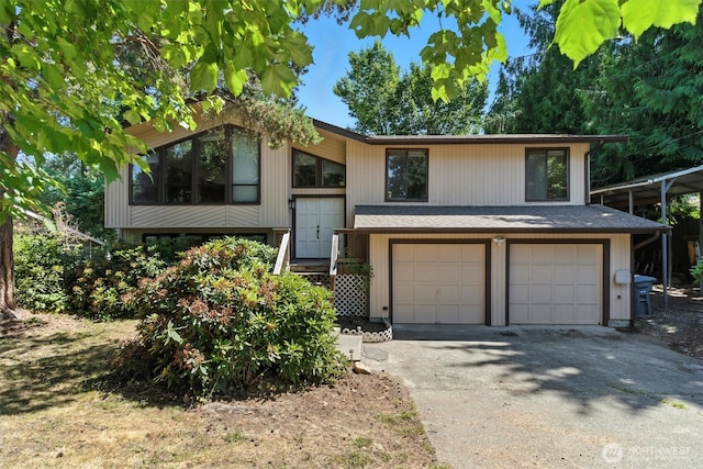 2417 179th Ave E, Lake Tapps, WA 98391 - split foyer home featuring an attached garage and driveway