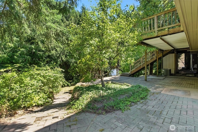 2417 179th Ave E, Lake Tapps, WA 98391 - view of yard featuring stairway and a wooden deck