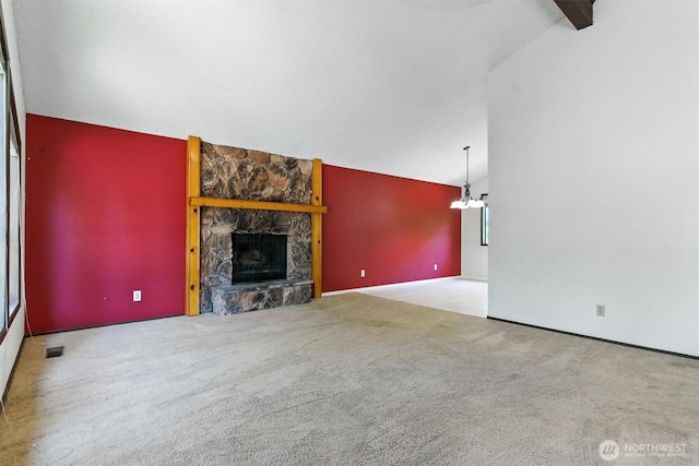 2417 179th Ave E, Lake Tapps, WA 98391 - unfurnished living room with vaulted ceiling, a fireplace, carpet floors, and a chandelier