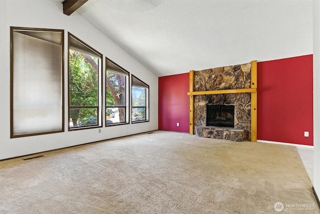 2417 179th Ave E, Lake Tapps, WA 98391 - unfurnished living room featuring carpet floors, a fireplace, and a textured ceiling