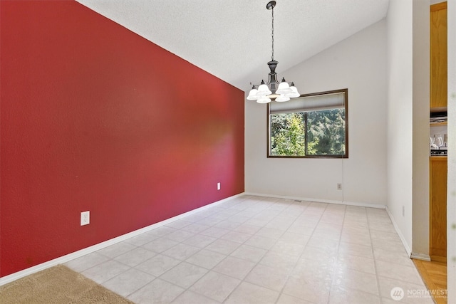 2417 179th Ave E, Lake Tapps, WA 98391 - unfurnished room with vaulted ceiling, a chandelier, and light tile patterned flooring