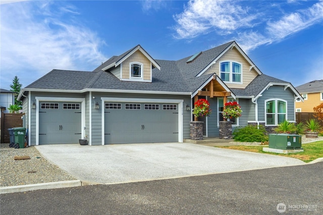 1118 26th St NW, Puyallup, WA 98373 - craftsman-style home featuring an attached garage, driveway, and a shingled roof