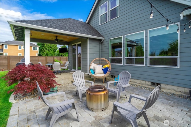 1118 26th St NW, Puyallup, WA 98373 - view of patio / terrace with ceiling fan, an outdoor fire pit, and outdoor dining area