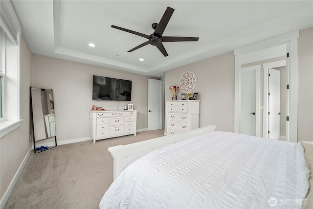 1118 26th St NW, Puyallup, WA 98373 - bedroom with light carpet, a tray ceiling, recessed lighting, and a ceiling fan