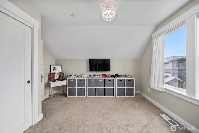1118 26th St NW, Puyallup, WA 98373 - additional living space featuring vaulted ceiling, carpet floors, and a chandelier