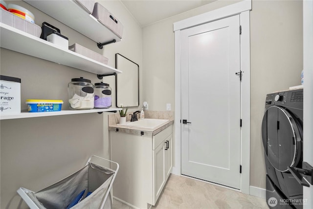 1118 26th St NW, Puyallup, WA 98373 - laundry area featuring washer / dryer and cabinet space