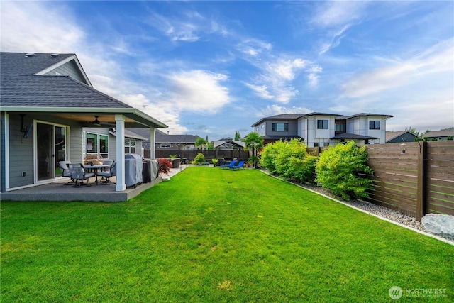 1118 26th St NW, Puyallup, WA 98373 - fenced backyard with a ceiling fan, a patio, and a residential view