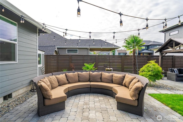1118 26th St NW, Puyallup, WA 98373 - fenced backyard with a patio area and outdoor lounge area