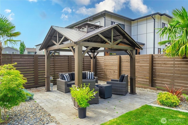 1118 26th St NW, Puyallup, WA 98373 - fenced backyard featuring a gazebo, outdoor lounge area, and a patio