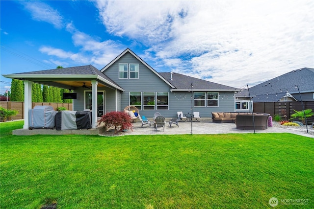 1118 26th St NW, Puyallup, WA 98373 - back of property with an outdoor hangout area, a patio, a fenced backyard, ceiling fan, and roof with shingles