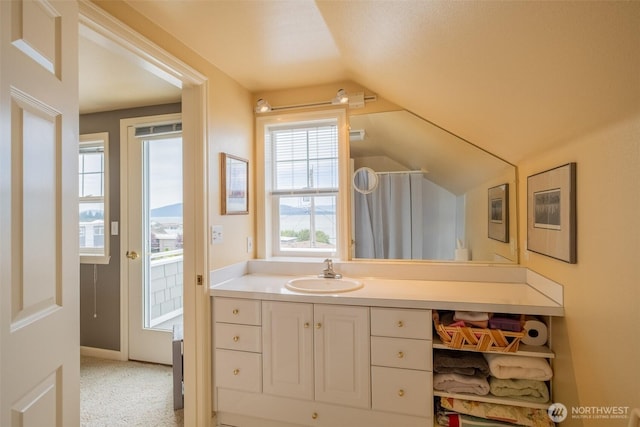 618 12th St, Bellingham, WA 98225 - bathroom with lofted ceiling and vanity
