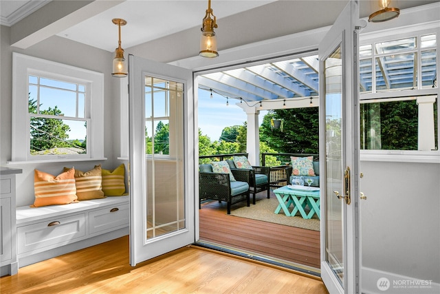 2456 4th Ave W, Seattle, WA 98119 - doorway to outside featuring healthy amount of natural light and light wood-style floors