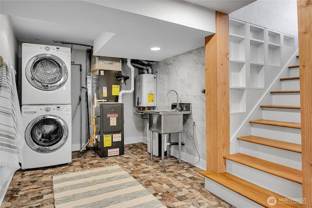 2456 4th Ave W, Seattle, WA 98119 - washroom with stacked washing machine and dryer, water heater, and heating unit