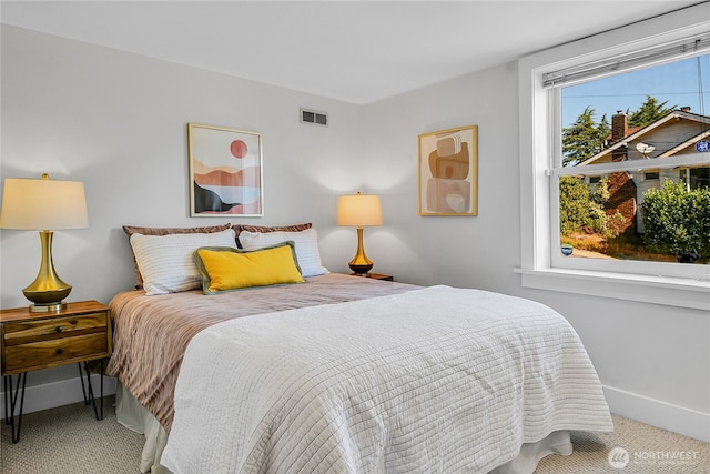 2456 4th Ave W, Seattle, WA 98119 - bedroom featuring carpet and baseboards