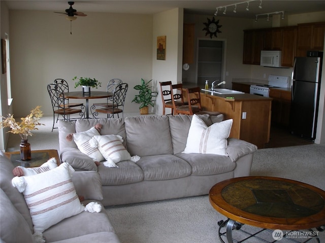 1601 Maiden Ln Unit B104, Wenatchee, WA 98801 - living area featuring ceiling fan and carpet flooring