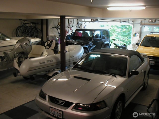 1601 Maiden Ln Unit B104, Wenatchee, WA 98801 - garage featuring a garage door opener