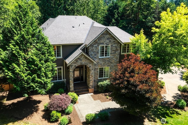 19735 183rd Way SE, Renton, WA 98058 - tudor house with stone siding and a shingled roof
