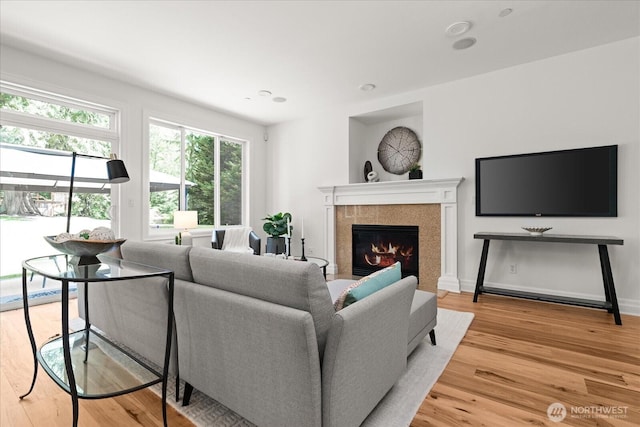 19735 183rd Way SE, Renton, WA 98058 - living area featuring light wood-type flooring, a fireplace, and recessed lighting