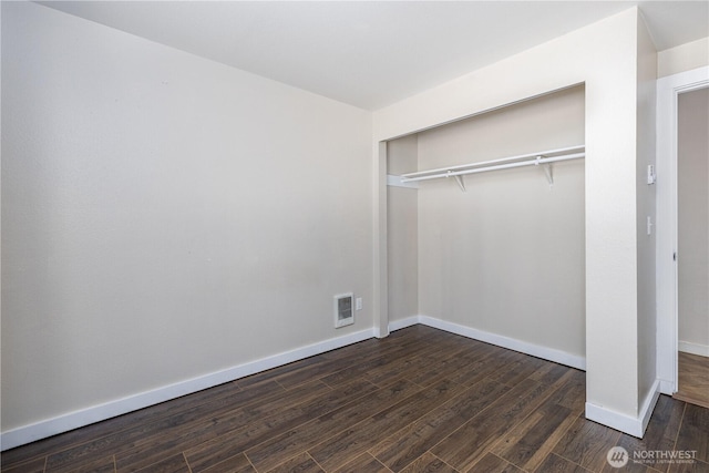120 E Rd Of Tralee, Shelton, WA 98584 - unfurnished bedroom with dark wood-type flooring and a closet