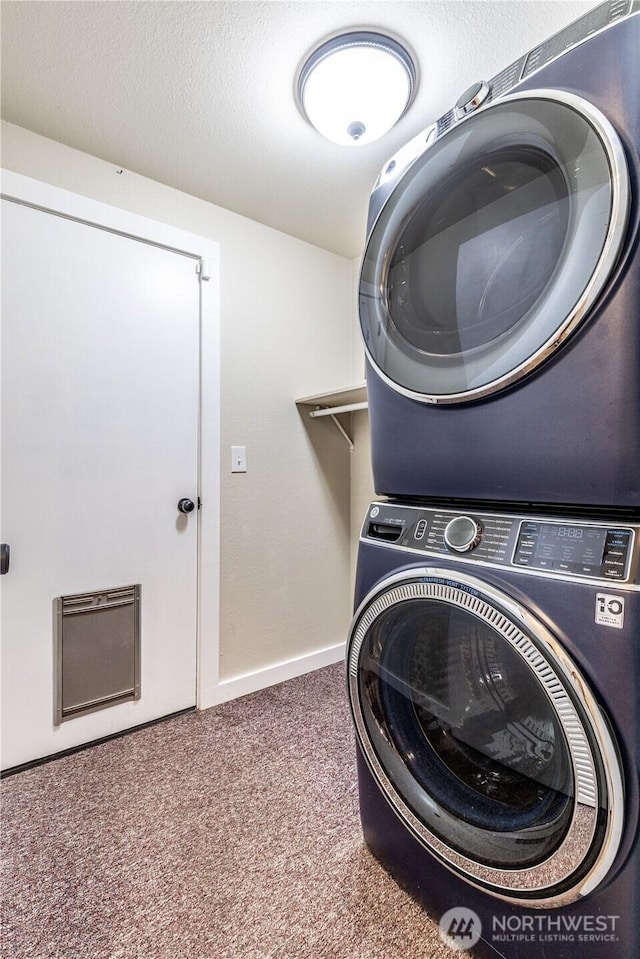 120 E Rd Of Tralee, Shelton, WA 98584 - washroom featuring stacked washer / drying machine and carpet floors
