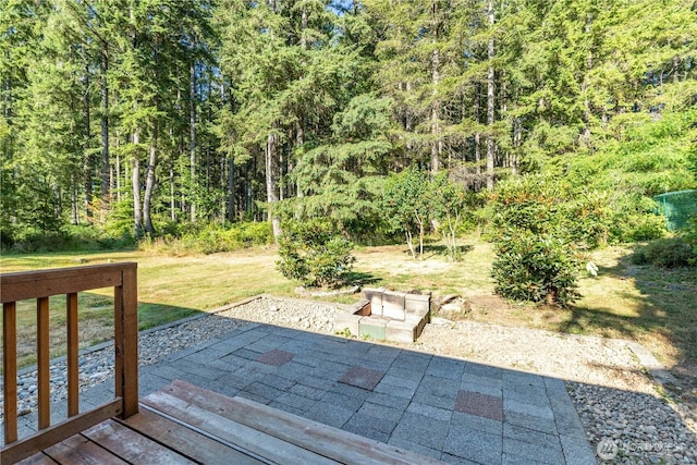 120 E Rd Of Tralee, Shelton, WA 98584 - wooden terrace with a lawn and a view of trees