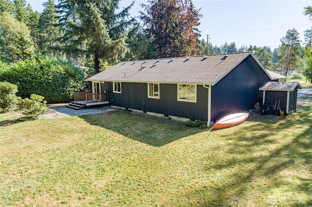 120 E Rd Of Tralee, Shelton, WA 98584 - back of house with a deck, a yard, and roof with shingles