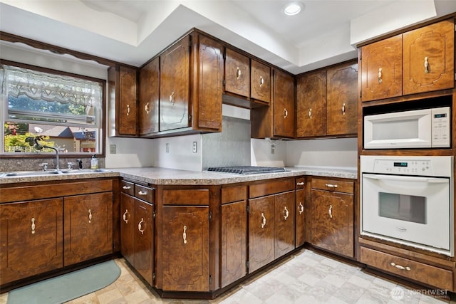 511 N Iron St, Centralia, WA 98531 - kitchen with white appliances, light floors, and light countertops